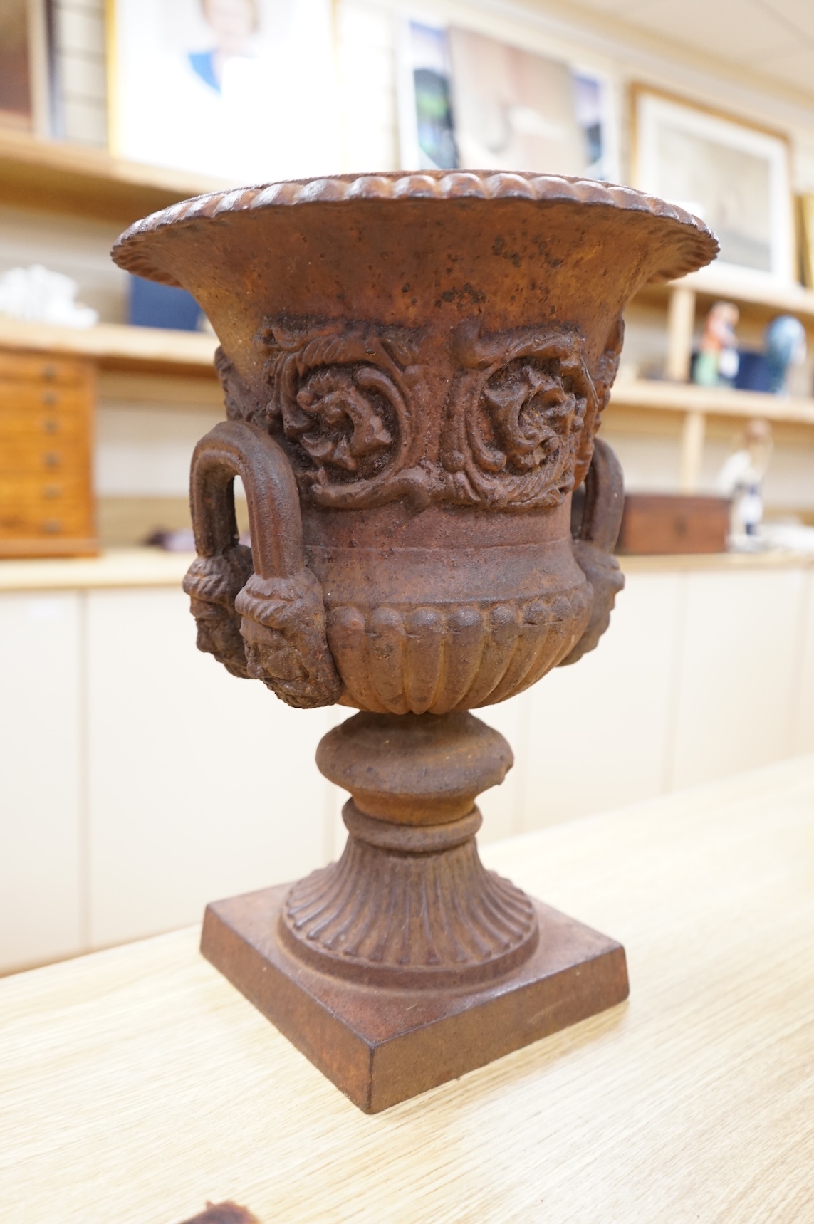 A Victorian cast iron campana urn, 38cm